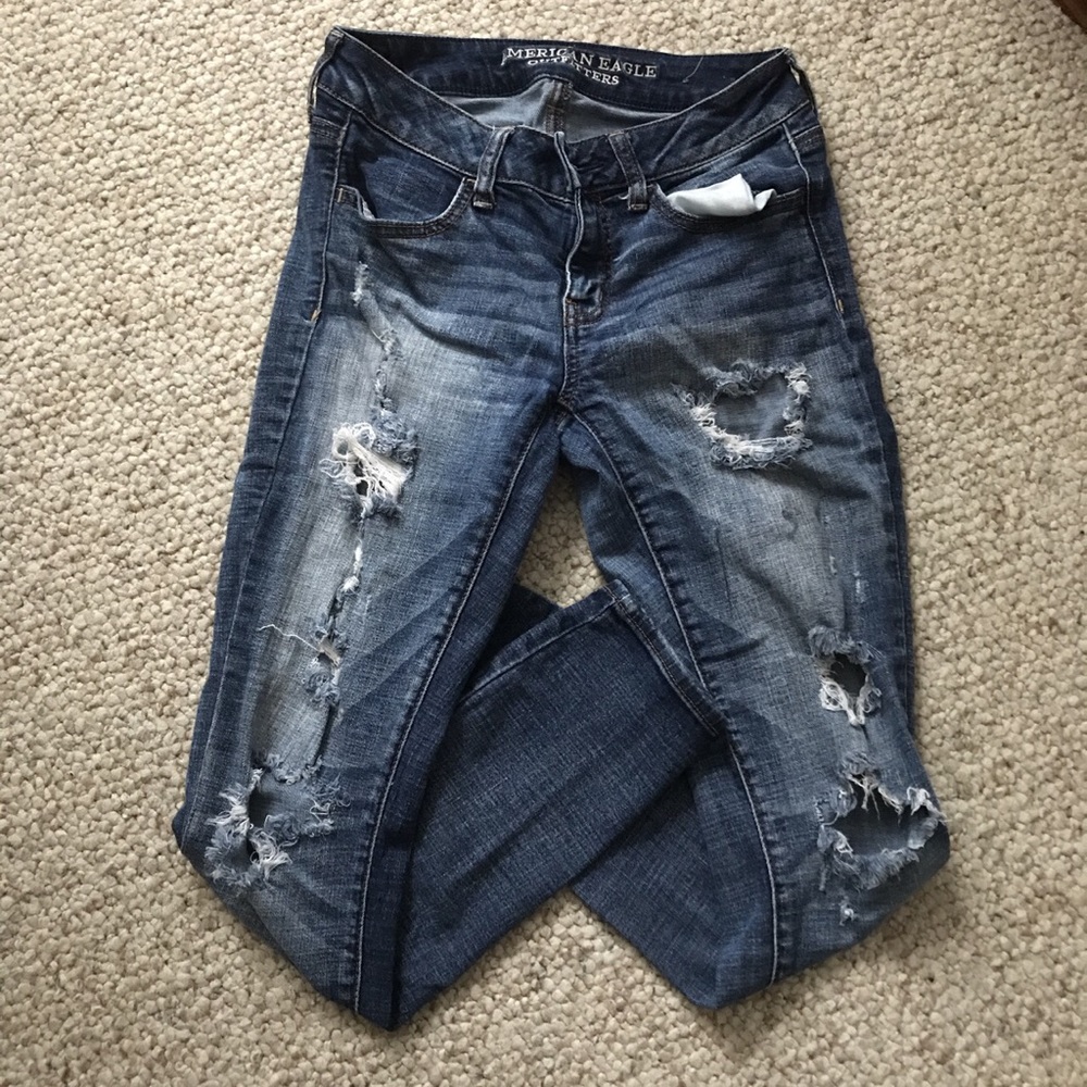 Mid Rise Ripped Skinny Jeans